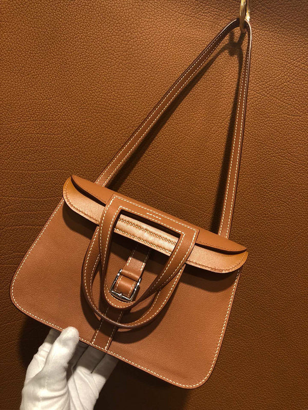 Side view of sculpted structured handbag
