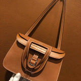 Side view of sculpted structured handbag