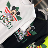 Flat lay presentation of Gucci luxury clothing with runway-inspired design