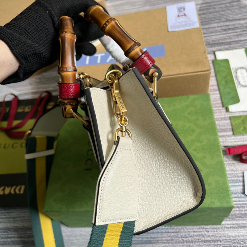 Handle and strap detail of everyday-luxe polished women's handbag – women's statement bag