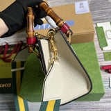 Handle and strap detail of everyday-luxe polished women's handbag – women's statement bag