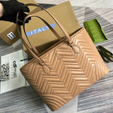 Side profile of signature refined women's handbag – women's luxury accessory