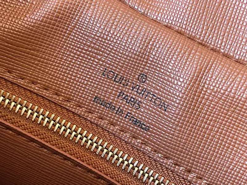 Side profile of refined statement women's handbag – women's luxury accessory