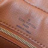 Side profile of refined statement women's handbag – women's luxury accessory