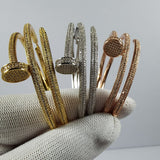 Front view of Cartier unisex jewelry piece