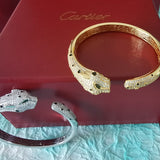 Side view of Cartier unisex jewelry piece