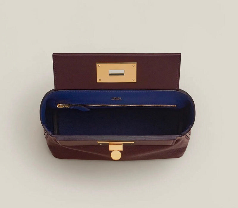 Side view of tailored structured handbag