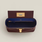 Side view of tailored structured handbag