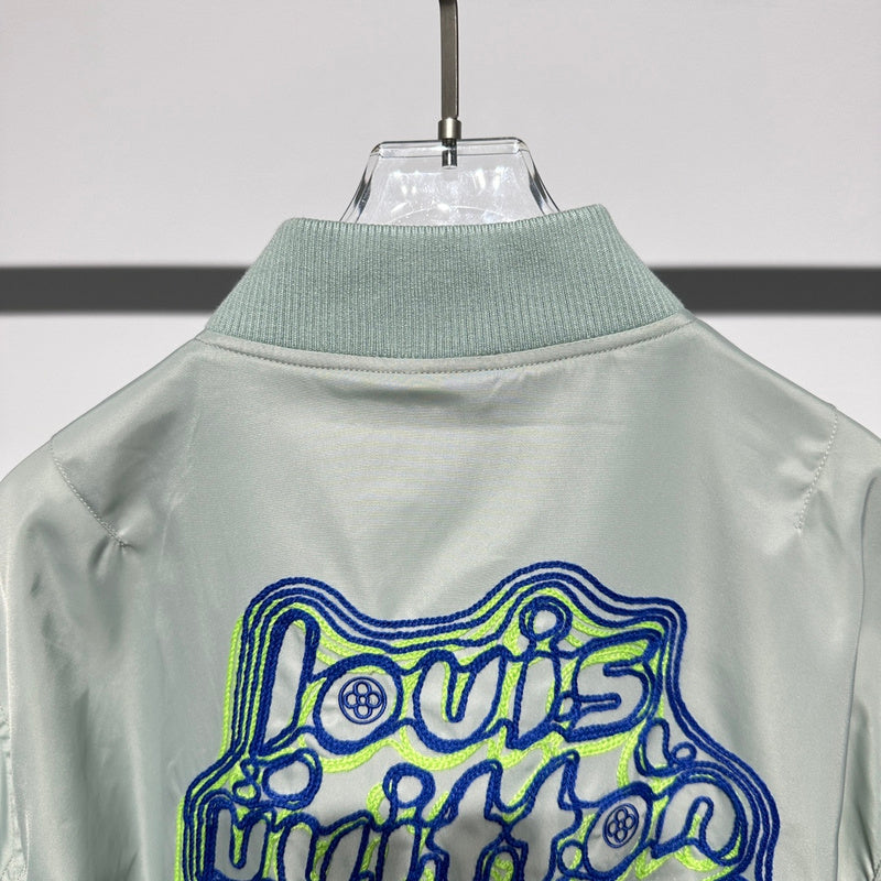Flat lay presentation of Louis Vuitton luxury clothing with everyday silhouette