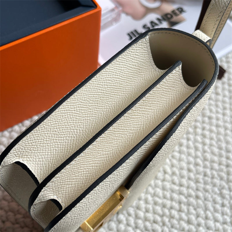 Side view of poised structured handbag