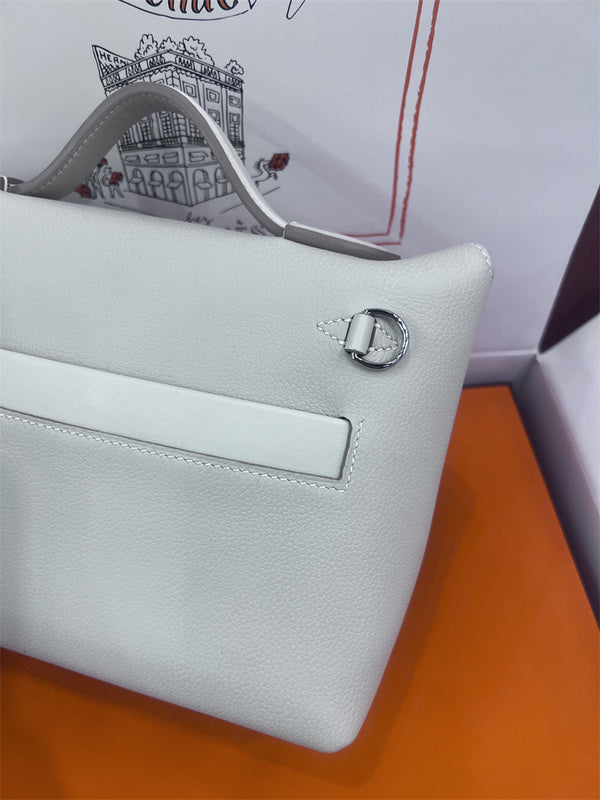 Side view of elegant structured handbag