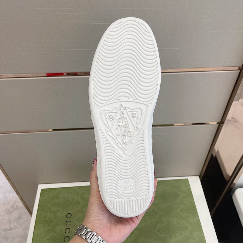 Side profile of Gucci clean off-white sneakers bold athletic profile