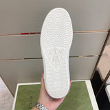 Side profile of Gucci clean off-white sneakers bold athletic profile