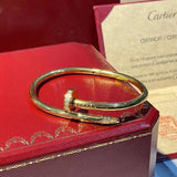 Close-up detail view of Cartier unisex jewelry piece