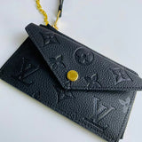 Front view of polished sleek women's handbag – women's luxury accessory