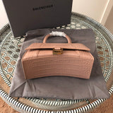 Back view of classic structured women's handbag – women's statement bag