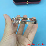 Angled view of Cartier unisex jewelry piece