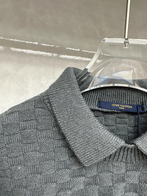 Close-up detail shot of Louis Vuitton luxury clothing with runway-inspired design