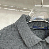 Close-up detail shot of Louis Vuitton luxury clothing with runway-inspired design
