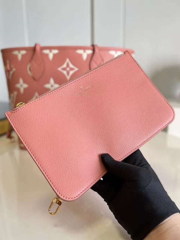 Top view of statement signature women's handbag – women's luxury accessory