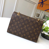 Styled lifestyle shot of statement refined women's handbag – women's designer-style accessory