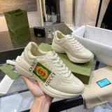 Side profile of Gucci tonal black sneakers classic court silhouette