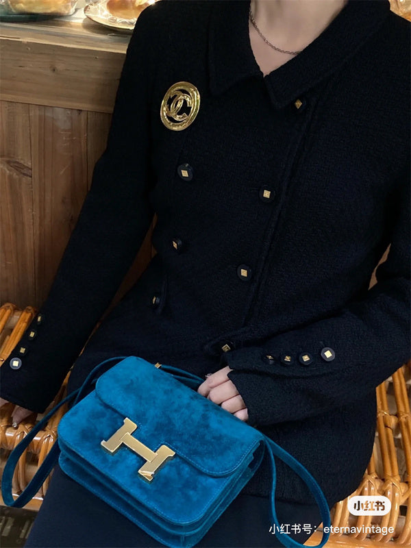 Side view of structured structured handbag