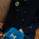 Side view of structured structured handbag