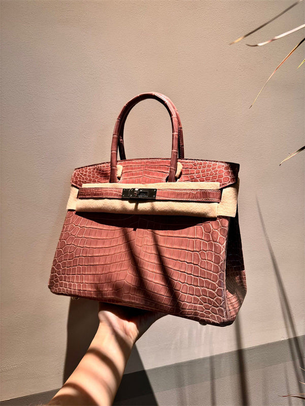 Side view of effortless structured handbag