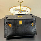 Side view of statement structured handbag