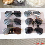 Lifestyle view of Louis Vuitton unisex sunglasses