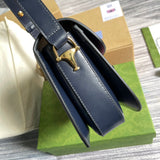 Top view of signature polished women's handbag – women's luxury accessory