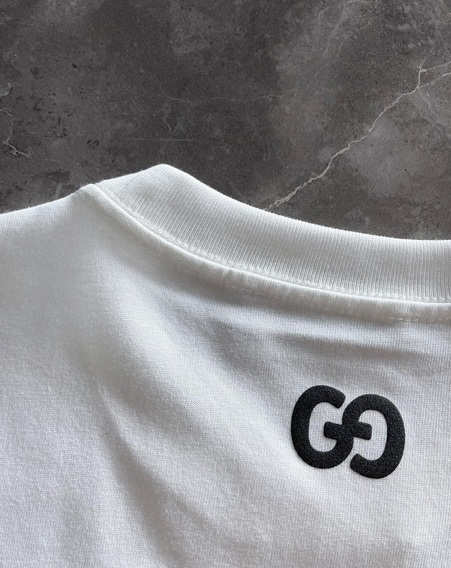 Front view of Gucci luxury clothing with monogram-inspired silhouette