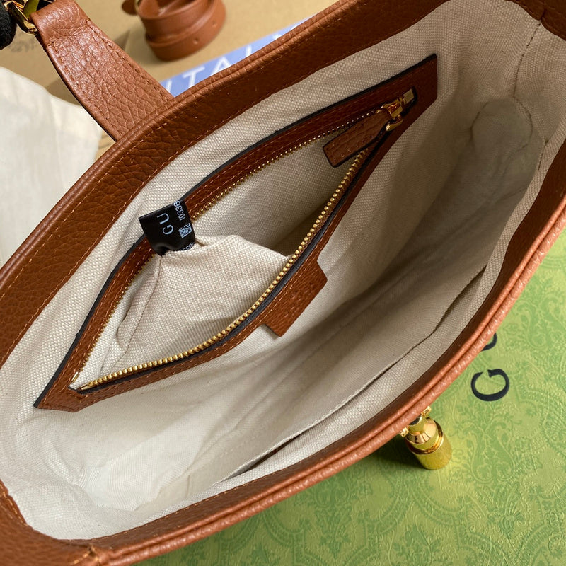 Side profile of structured statement women's handbag – women's statement bag