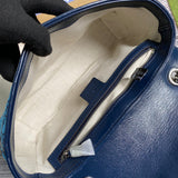 Side profile of premium structured women's handbag – women's luxury accessory