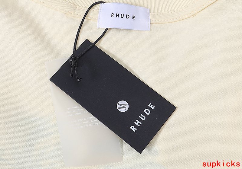 Close-up detail shot of Rhude luxury clothing with monogram-inspired silhouette