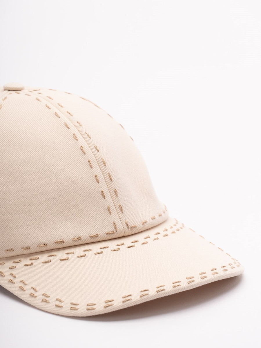 Close-up of Fendi hats hardware and fine stitching