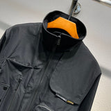 Close-up detail shot of Louis Vuitton luxury clothing with label-forward styling