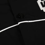 Front view of Louis Vuitton luxury clothing with monogram-inspired silhouette
