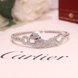 Front view of Cartier unisex jewelry piece