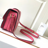 Styled lifestyle shot of modern statement women's handbag – women's statement bag