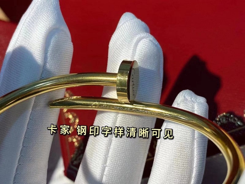 Close-up detail view of Cartier unisex jewelry piece