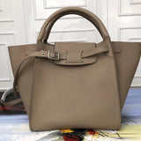 Side profile of modern premium women's handbag – women's statement bag