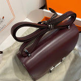 Side view of clean-lined structured handbag