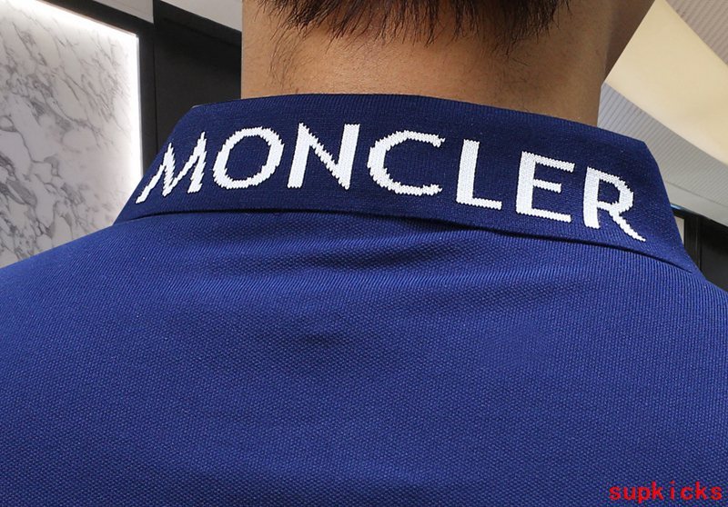 Close-up detail shot of Moncler luxury clothing with contemporary cut