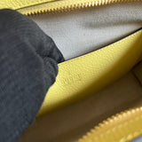 Side profile of signature refined women's handbag – women's designer-style accessory