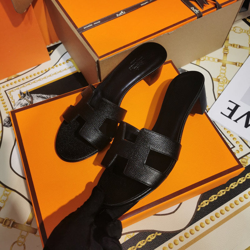 Hermès Black Slide Sandals - Heel Detail View
