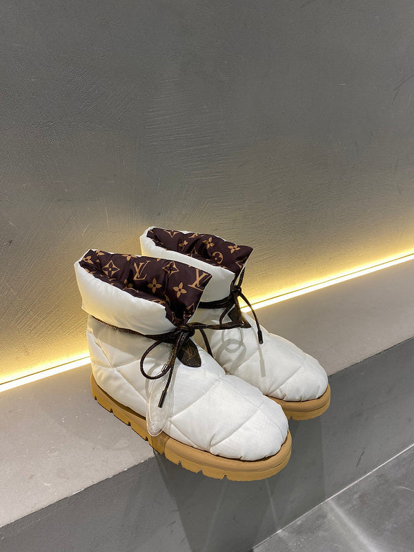 Louis Vuitton White Low-Top Sneakers - Angled View