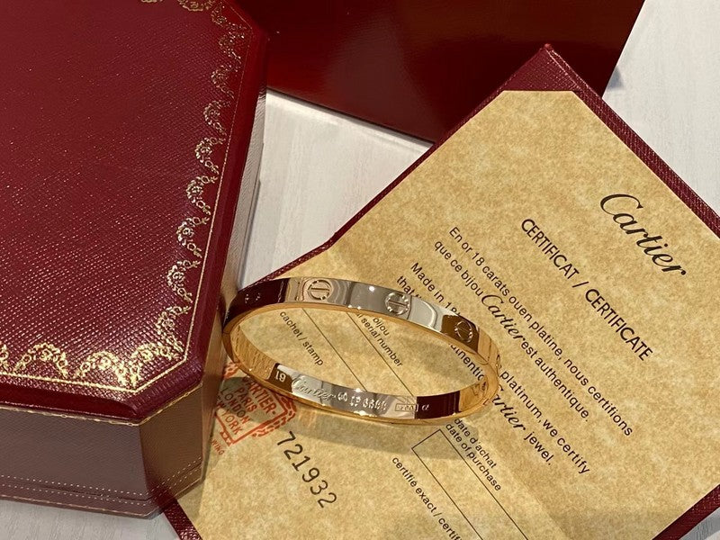 Side view of Cartier unisex jewelry piece