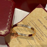 Side view of Cartier unisex jewelry piece